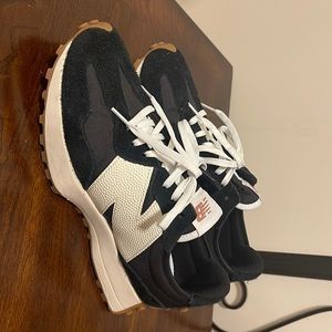 Like new.  New balance 327